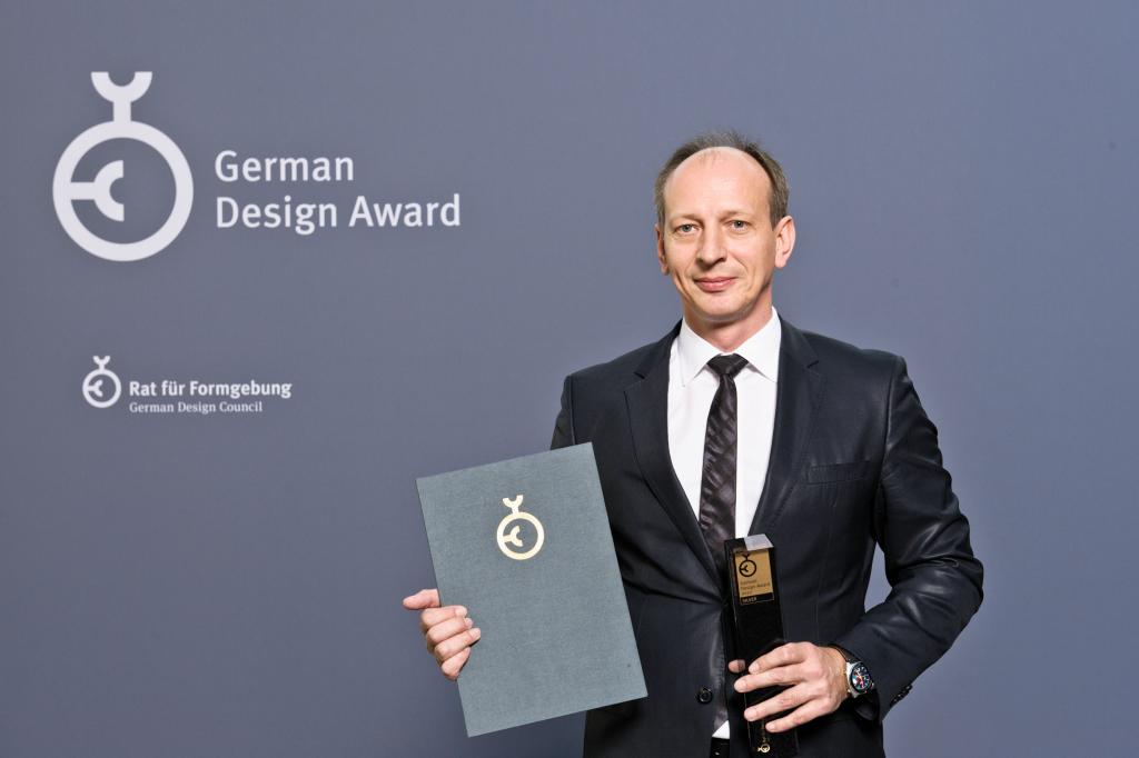 Jacek Frohlich z German Design Award 2012. fot. Lutz Sternstein